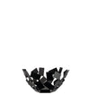 Black metal decorative bowl by Alessi, composed of scattered geometric fragments on a white background.