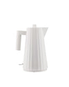 White pleated electric kettle by Alessi, featuring a modern tapered shape.