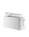 White pleated toaster by Alessi with an integrated warming rack, control dials, and buttons.