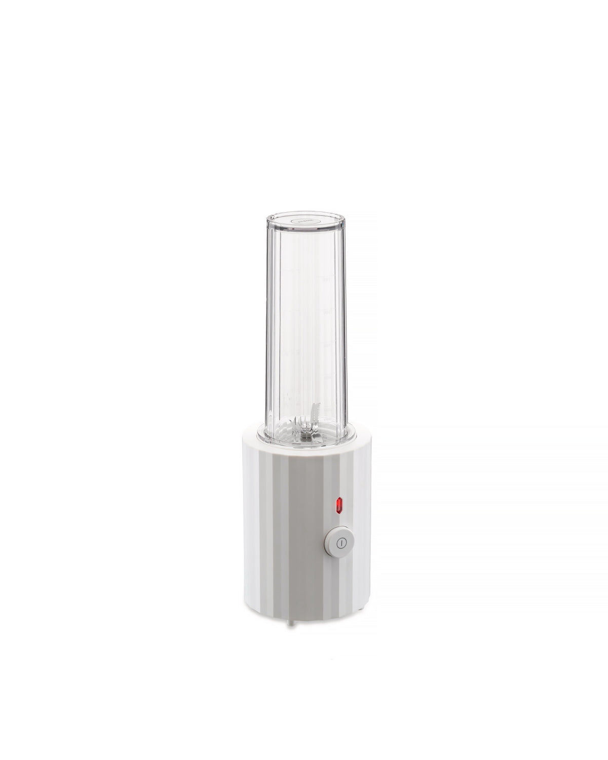 White Plissé blender by Alessi with clear measuring cup, visible blades, red light, and power button.