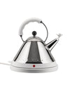 Chrome electric kettle by Alessi with white ergonomic handle, white bird-shaped whistle, and red power indicator light on a white base.