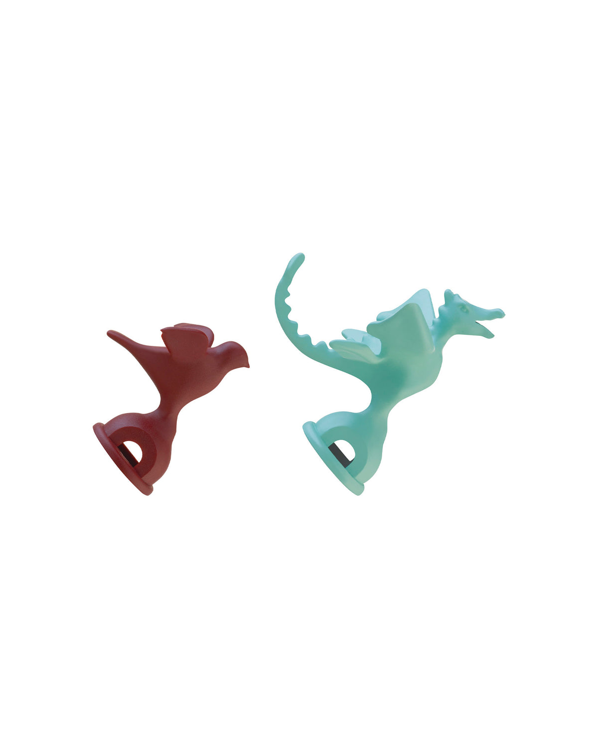 Two decorative bottle pourers by Alessi: a reddish-brown bird and a teal dragon, on white.