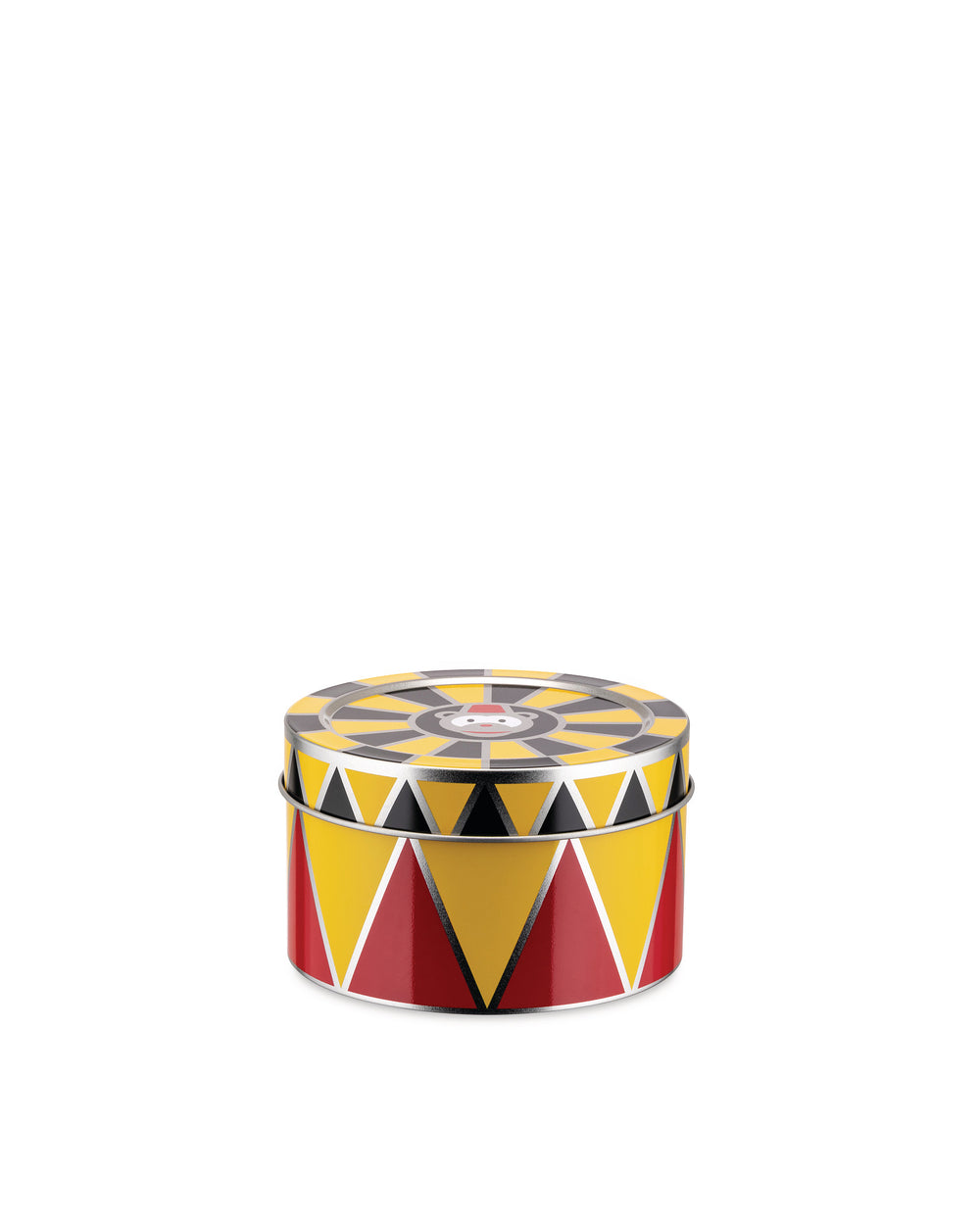 Round metal container by Alessi with red, yellow, and black circus-themed triangles and a monkey face on the lid.