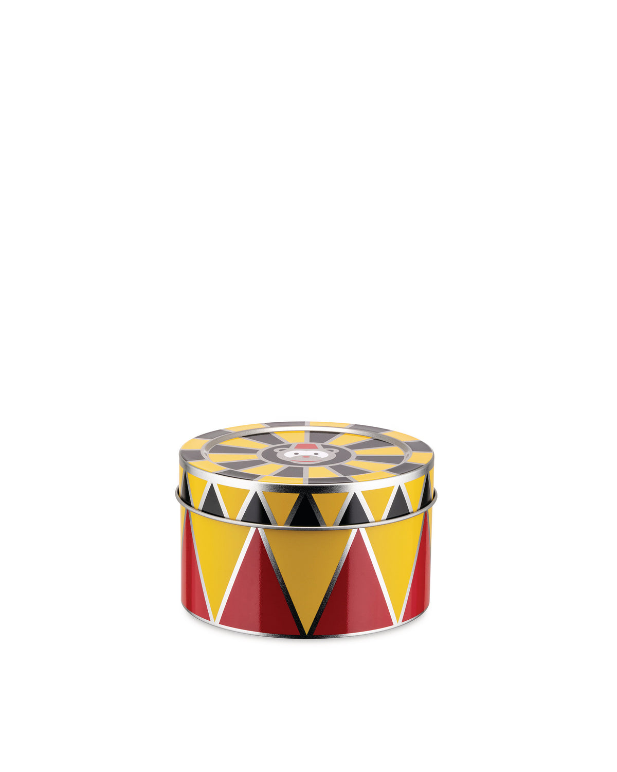 Round metal container by Alessi with red, yellow, and black circus-themed triangles and a monkey face on the lid.