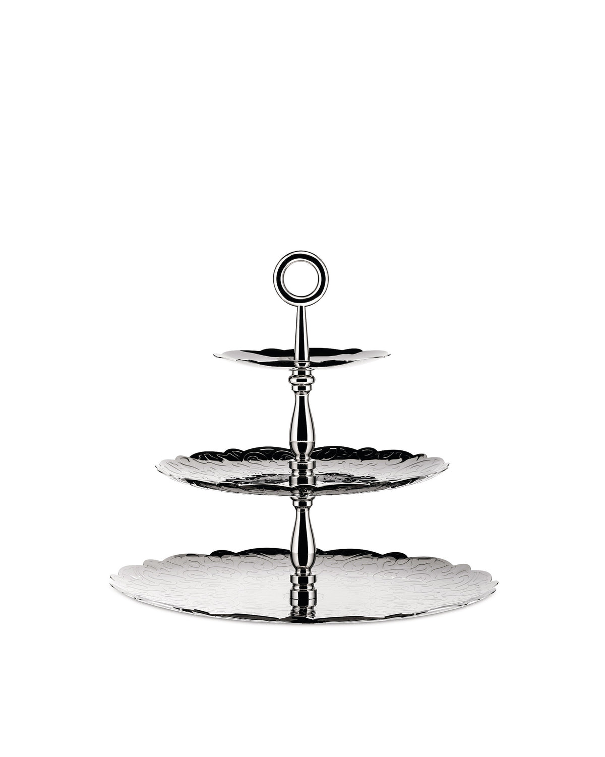 Three-tier silver metallic serving stand by Alessi with scalloped edges and engraved swirling patterns.