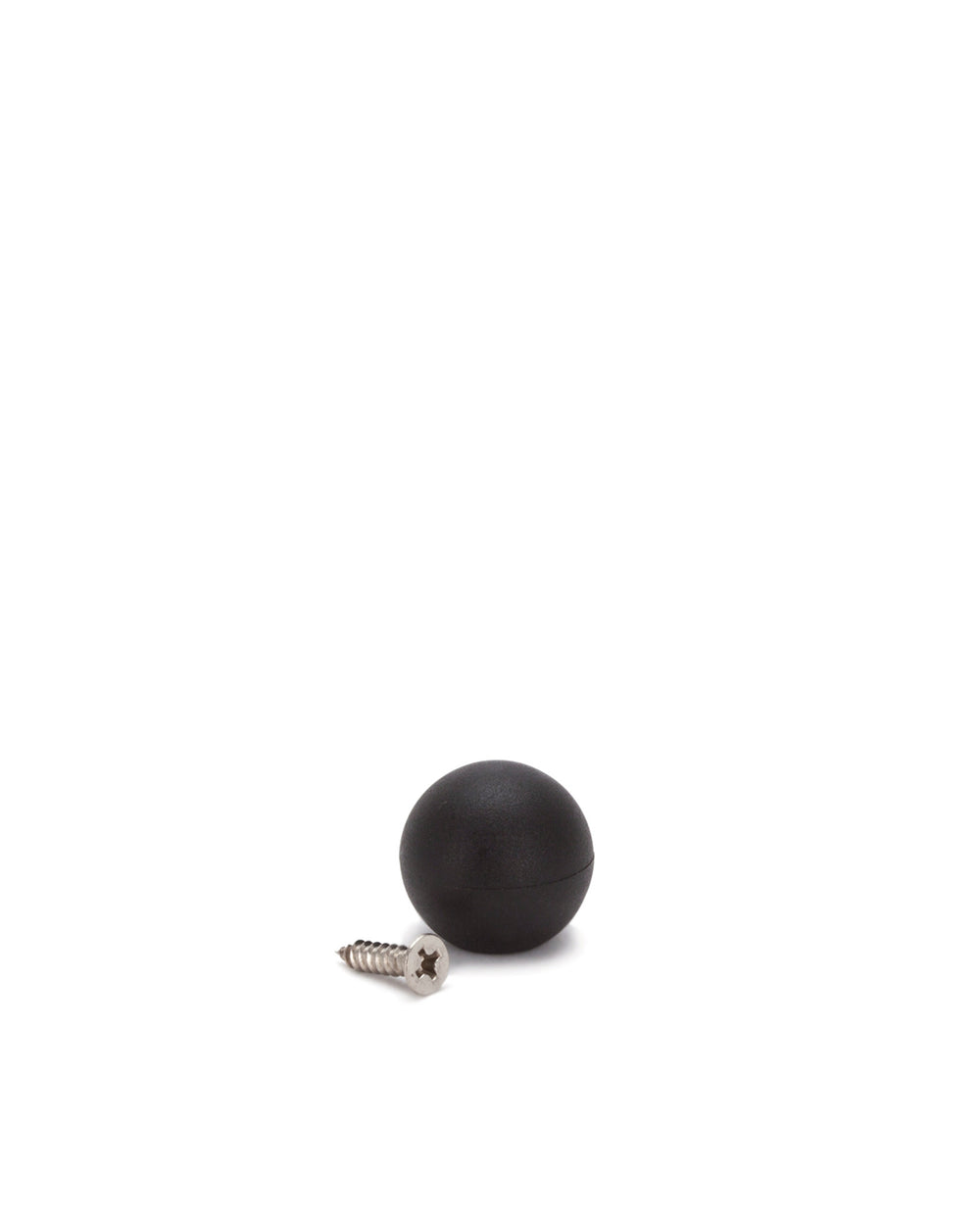Black rubber sphere spare part by Alessi, with a visible seam and a silver Phillips head screw.