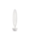 White leaf-shaped decorative object by Alessi, with an intricate perforated pattern and a round base.