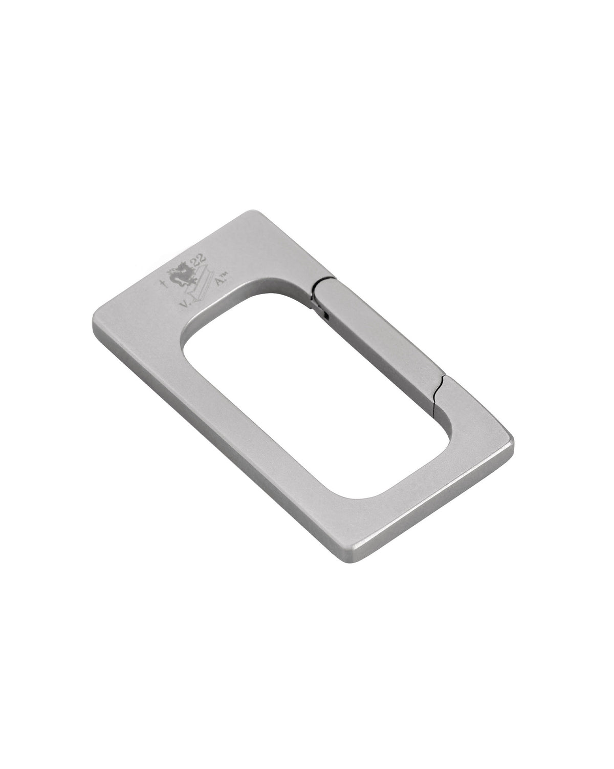 Silver rectangular metal utility clip by Alessi, with a spring-loaded gate and engraved logo, angled view.