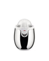 Chrome and white electric juicer by Alessi with a clear plastic dome on a white background.