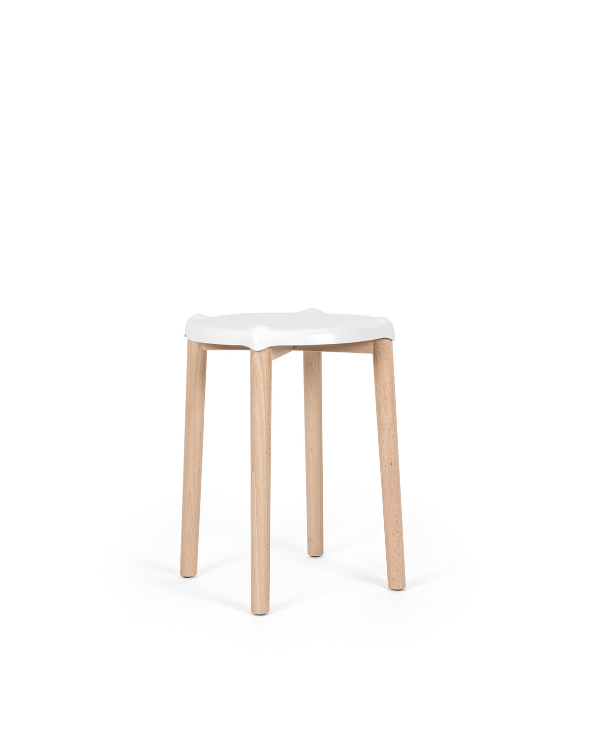 White Poêle Collection stool by Alessi with light wooden legs, featuring a simple, modern design.