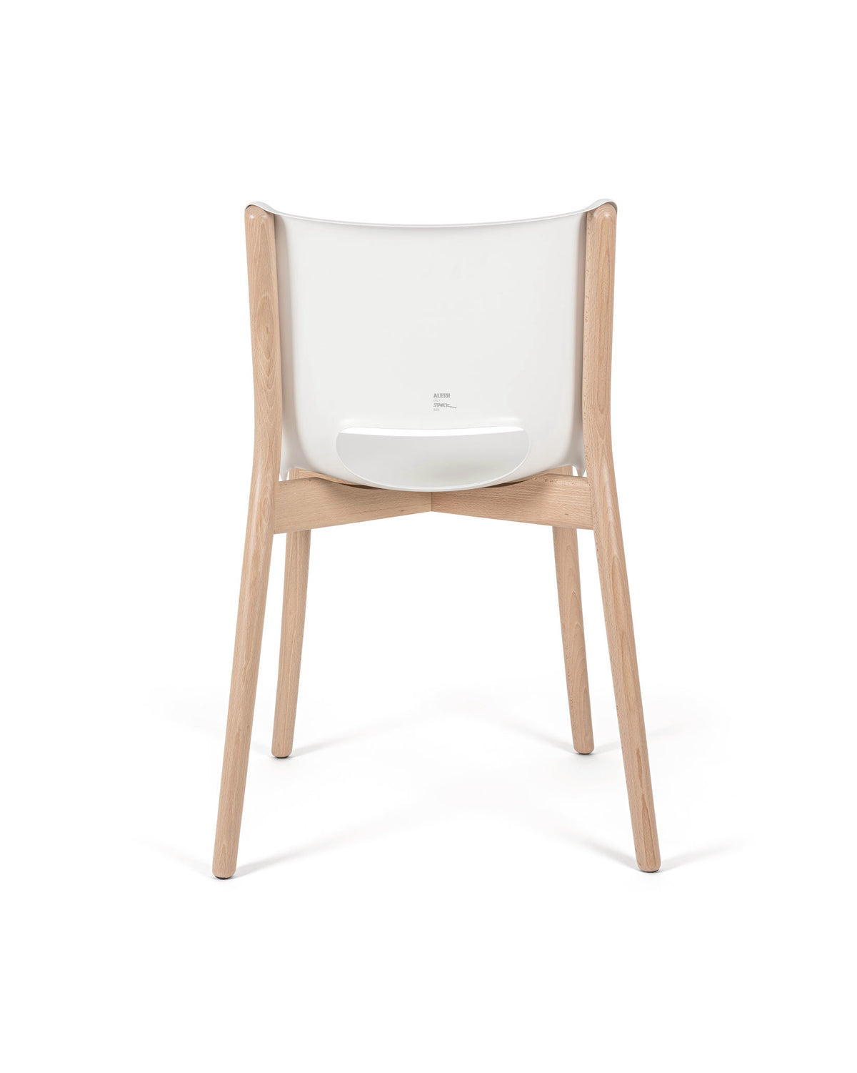Modern white and wood chair by Alessi, with a curved backrest and visible 'ALESSI STARCK' text, shown from the back.