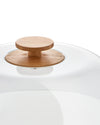 Clear glass lid with a light bamboo wood knob by Alessi, cropped top-down view.
