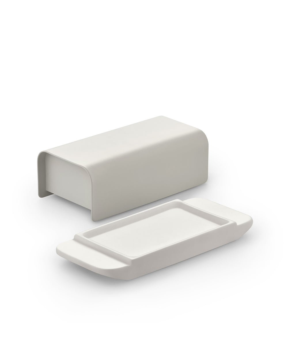 Matte light grey butter dish by Alessi, featuring a rectangular base and a detached U-shaped cover.